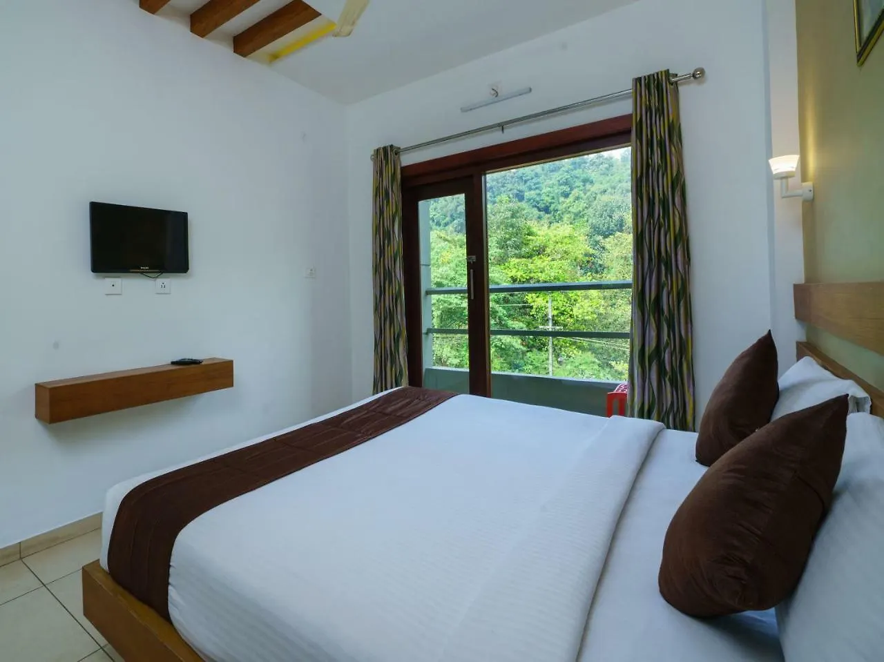 Oyo 5024 Mist Heaven Hill Resort Tindummal India